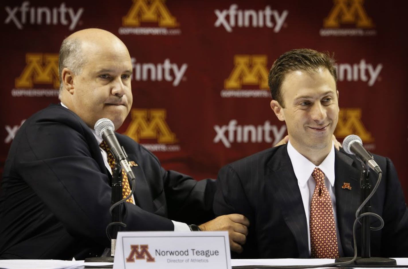 The $175,000 in overspending occurred with permission from then-athletic director Norwood Teague, left, shown with Richard Pitino when his hiring was announced, a senior official said Tuesday.