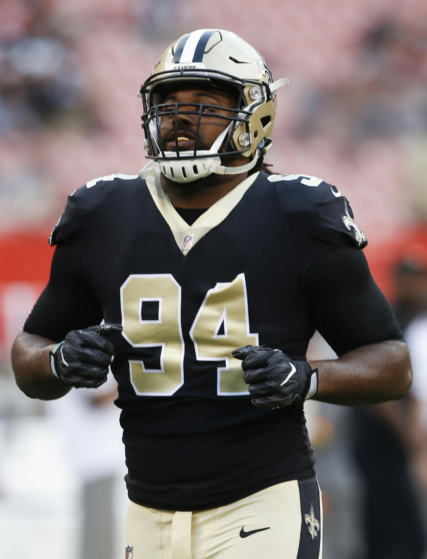 New Orleans Saints defensive end Cameron Jordan warms up before playing the Cleveland Browns in a NFL preseason football game, Thursday, Aug. 10, 2017, in Cleveland. (AP Photo/Ron Schwane) ORG XMIT: CDS10