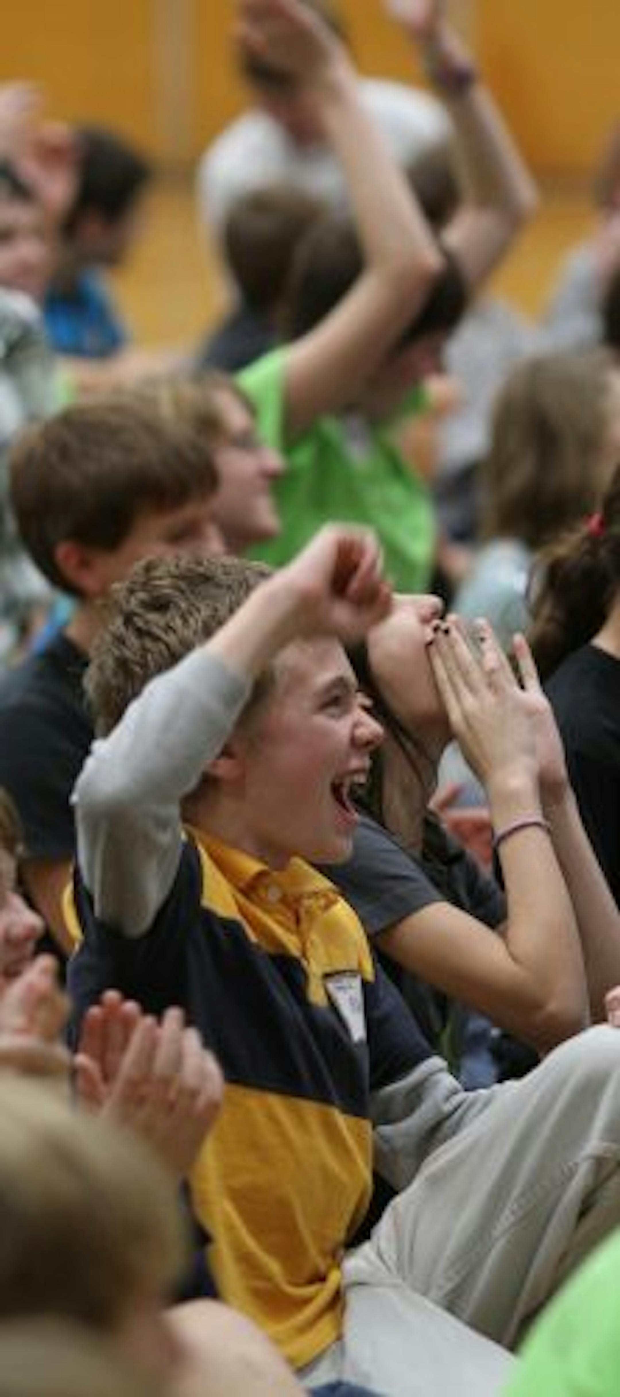 Parkview Center School 7th and 8th graders and high school students yelled and cheered during a courage retreat at the school.