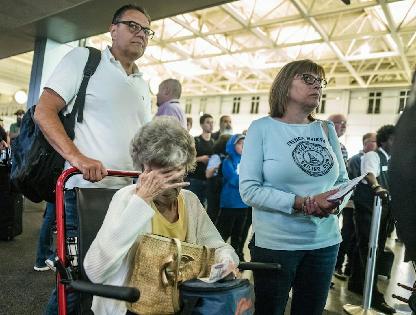 Mark West, his wife Melanie, and mother-in-law Josephine Patterson, 83, expressed frustration trying to make their Delta flight from MSP back home to Raleigh, N.C. While still in line for security, their flight was due to take off in less than 40 minutes.