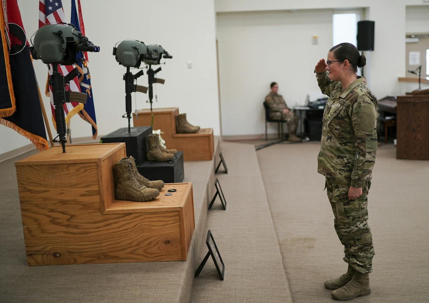 Spc. Nicole Cavanaugh saluted the memorial of Chief Warrant Officer James A. Rogers Jr., at North Fort Hood, Texas, on Sunday.