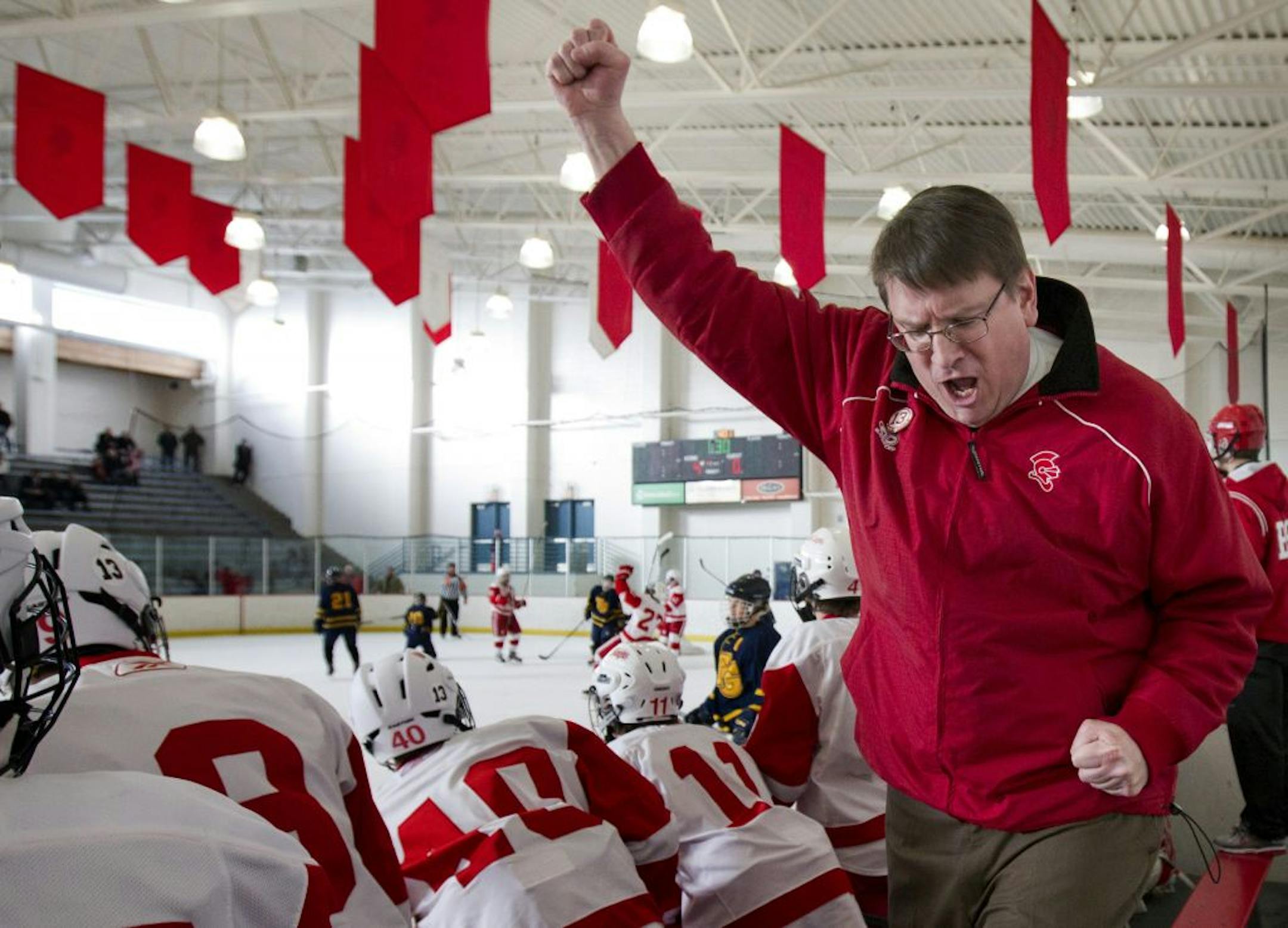 Benilde-St. Margaret's head coach Ken Pauly celebrated after his team scored a goal in a 6-0 victory over Totino-Grace last month. The Red Knights had to learn to move on from Jack Jablonski's injury while not dismissing their friend and teammate.