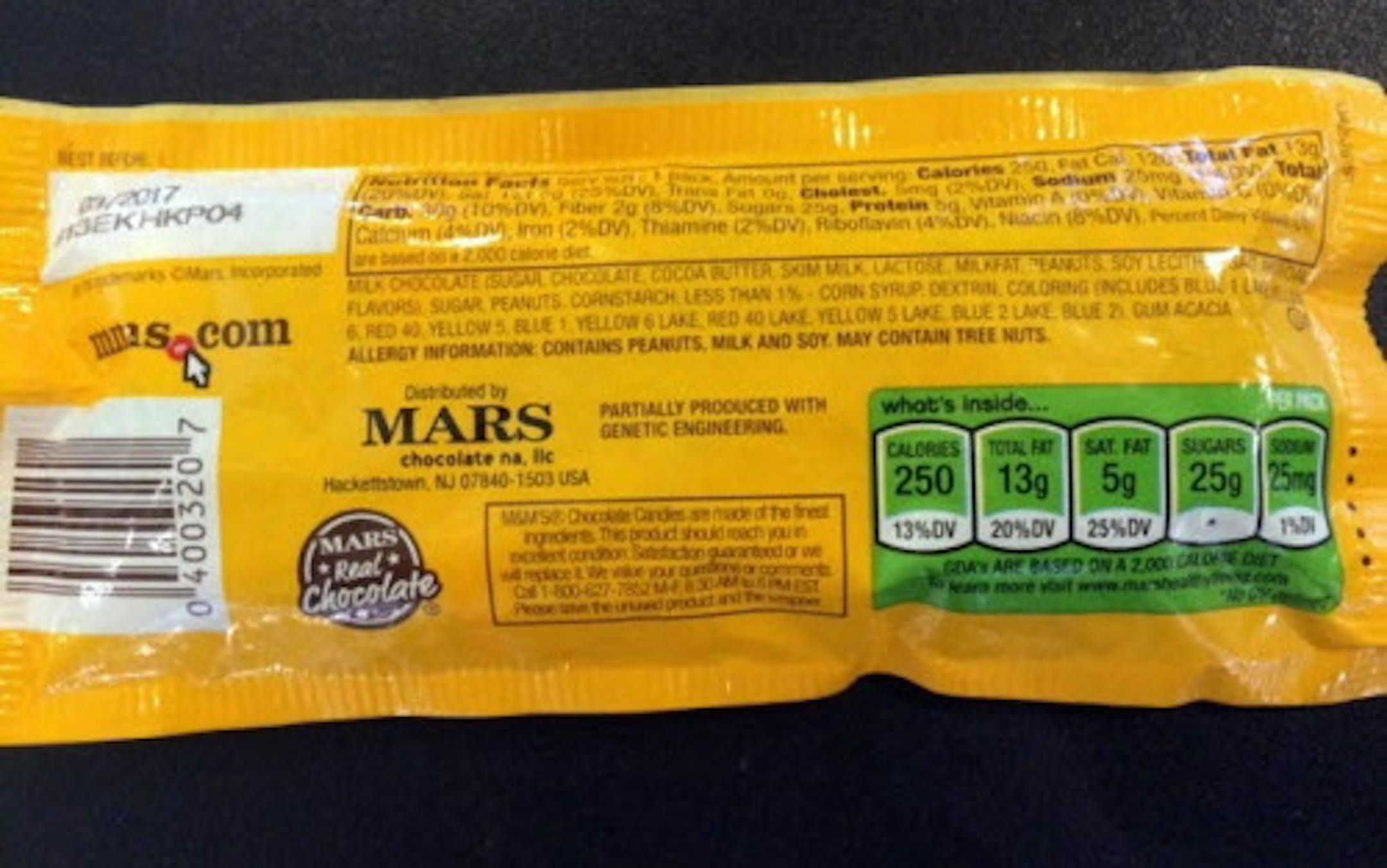 A bag of Mars Peanut M&M's bought outside a U.S. Senate snack bar on Capitol Hill last week is labeled to comply with Vermont's soon-to-be implemented GMO labeling law. Although the law does not take effect until July 1, some companies, including General Mills and Mars candy, have already changed their packaging to be "Vermont-compliant" and will distribute those new packages nationwide.