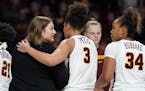 Gophers guard Destiny Pitts and coach Lindsay Whalen.