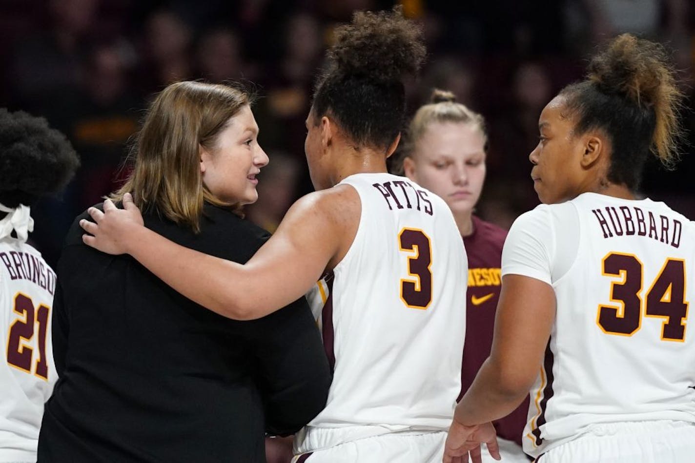 Gophers guard Destiny Pitts and coach Lindsay Whalen.