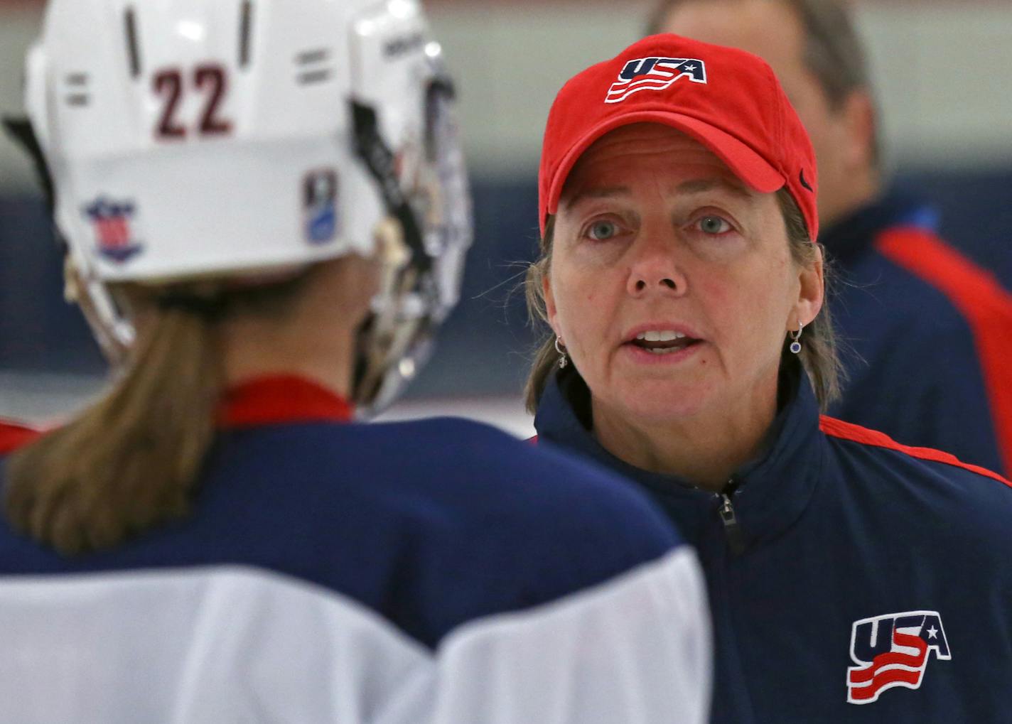 Kacey Bellamy talked with USA Womens Hockey Coach Katey Stone during practice at the Schwan Super Rink in Blaine on 12/17/13.] Bruce Bisping/Star Tribune bbisping@startribune.com Kacey Bellamy, Katey Stone/roster. Kellell and Bozek were not at practice.