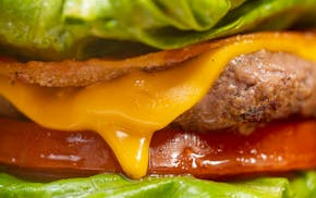 The Double California Cheese at Lion’s Tap in Eden Prairie is among our picks for best burgers in the Twin Cities.
