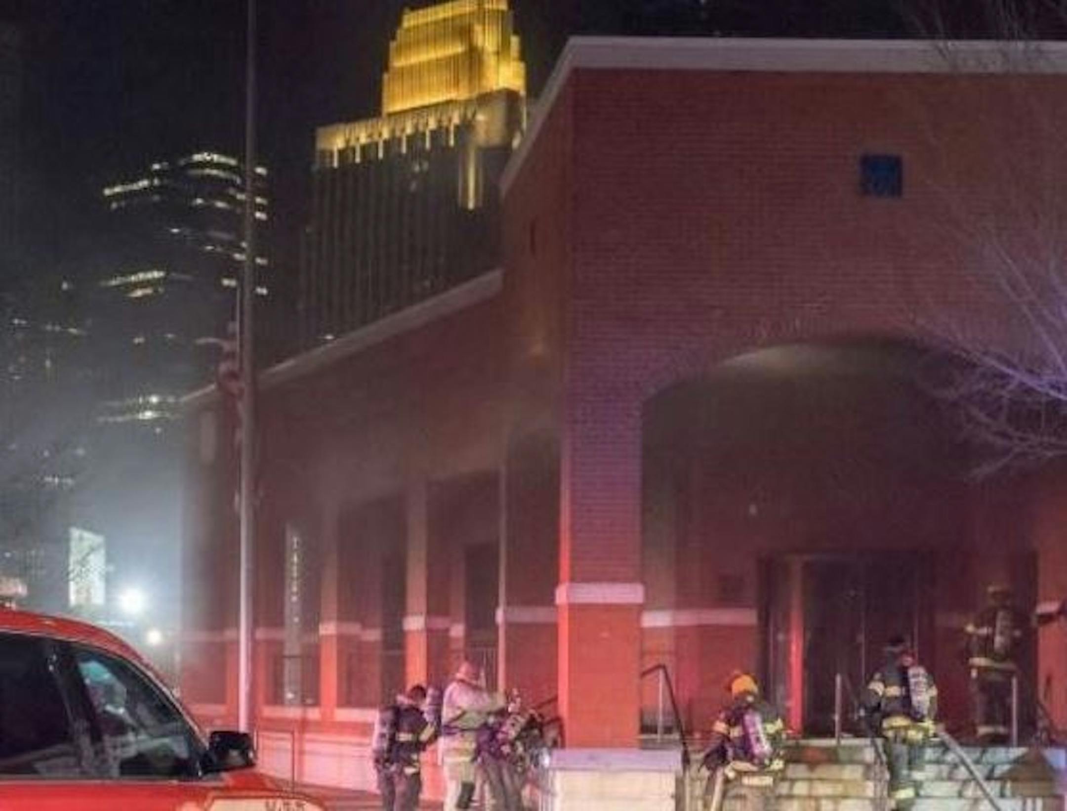 Firefighters broke through the main entrance to get to the fire inside this downtown Minneapolis post office.