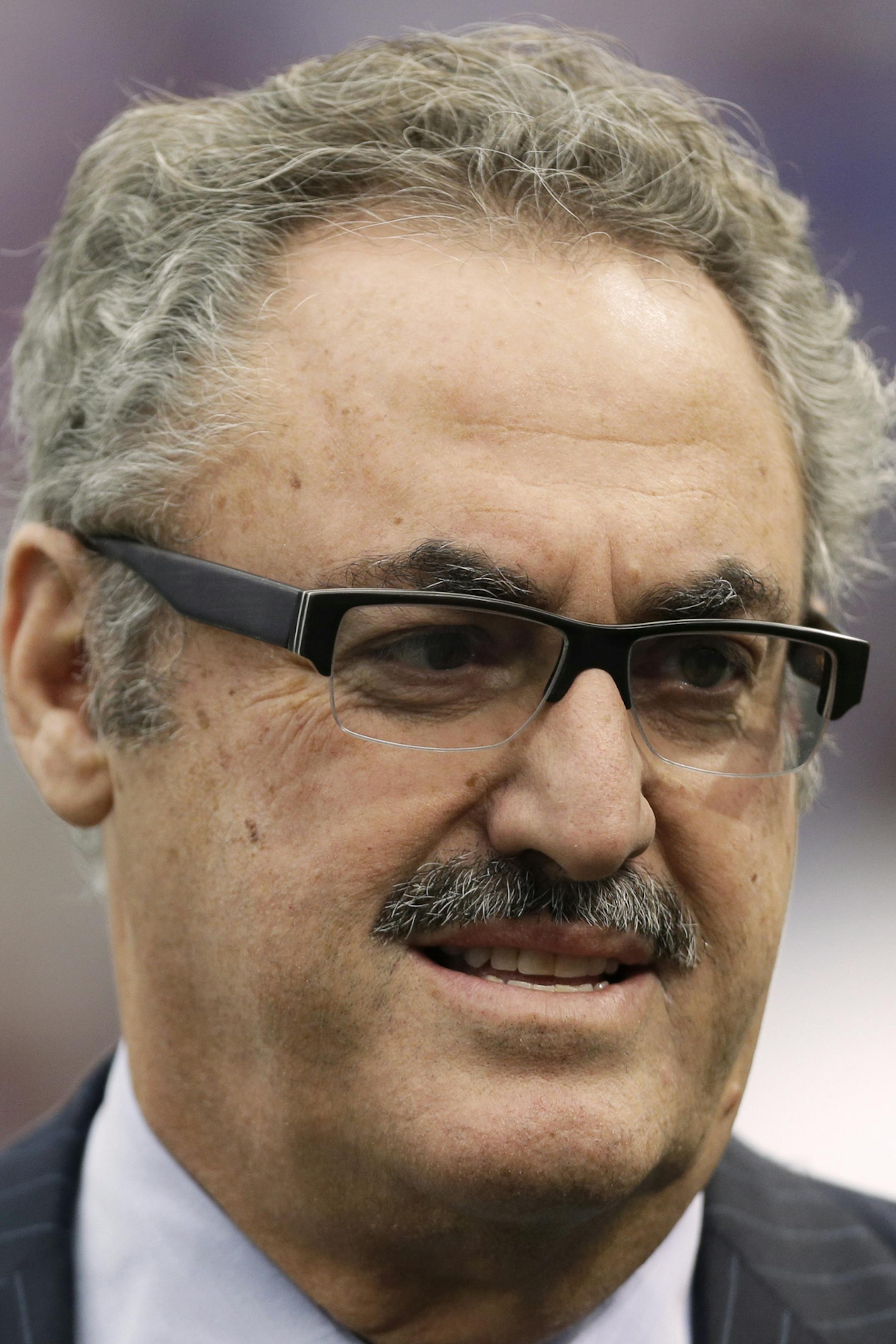 Minnesota Vikings owner Zygi Wilf waits on the field before an NFL football game between the Vikings and the Cleveland Browns Sunday, Sept. 22, 2013, in Minneapolis. (AP Photo/Charlie Neibergall) ORG XMIT: MIN2013092614562874