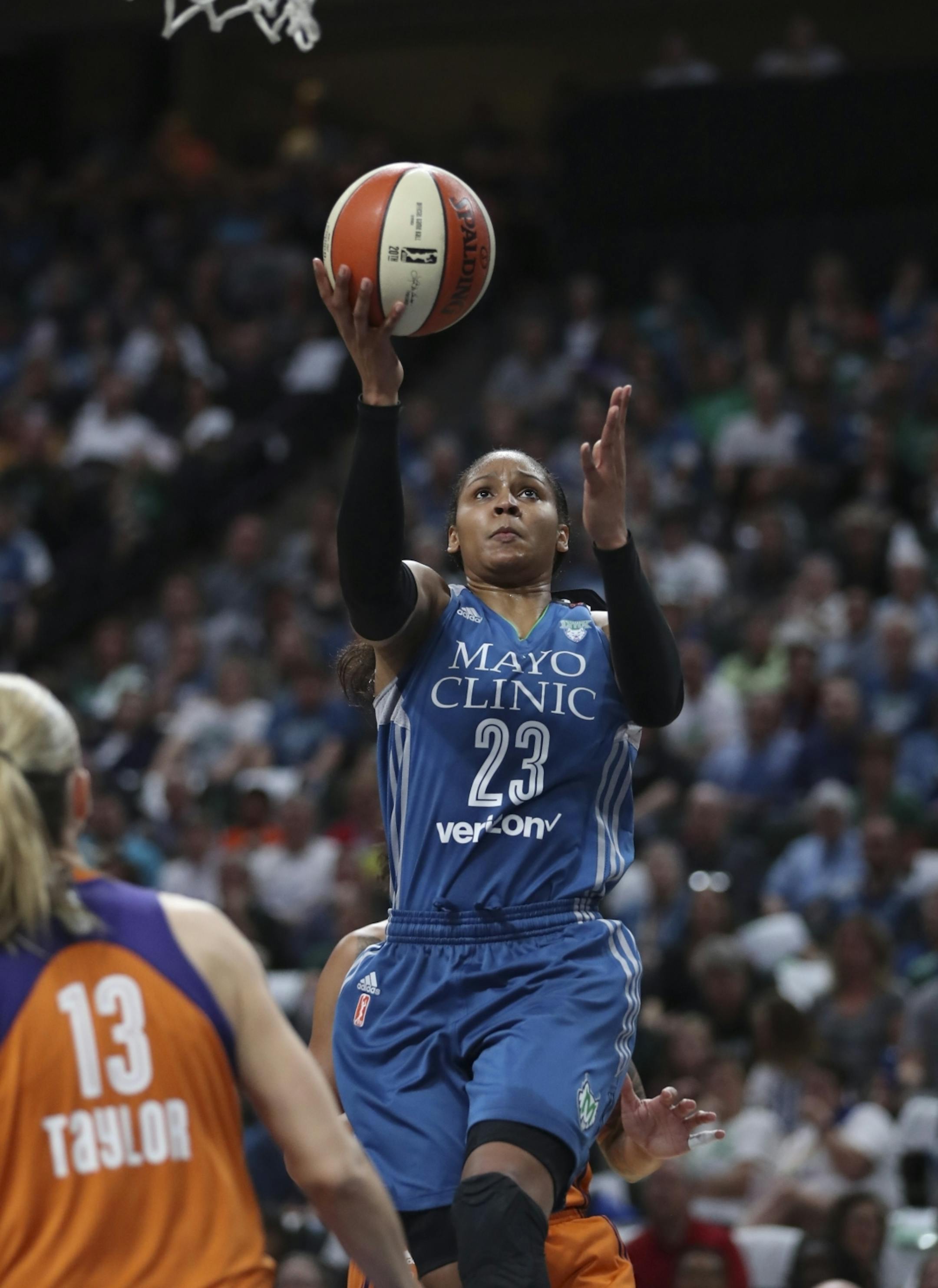 Minnesota Lynx forward Maya Moore (23) put up a shot in the first half.