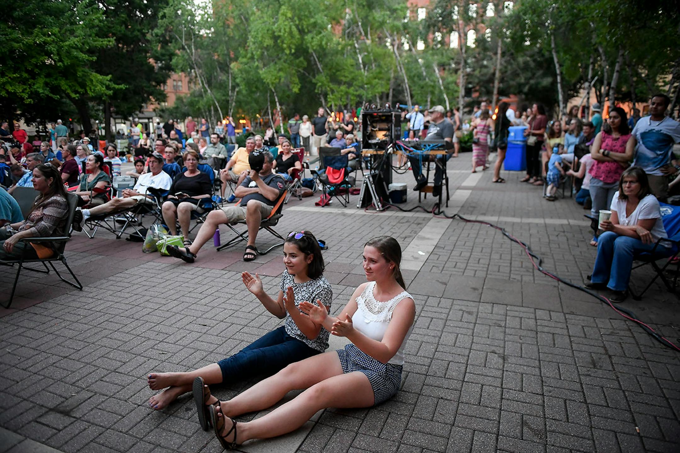 Isabel Toghramadjian, 13, of Blaine, and Natasha Bednarz, of Yardley, Penn., danced the Macarena as the band, "3 Minute Hero" performed Thursday night .