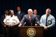 U.S. Attorney Andrew Luger announces charges against 14 Minneapolis gang members with possession of machine guns and fentanyl trafficking Wednesday at