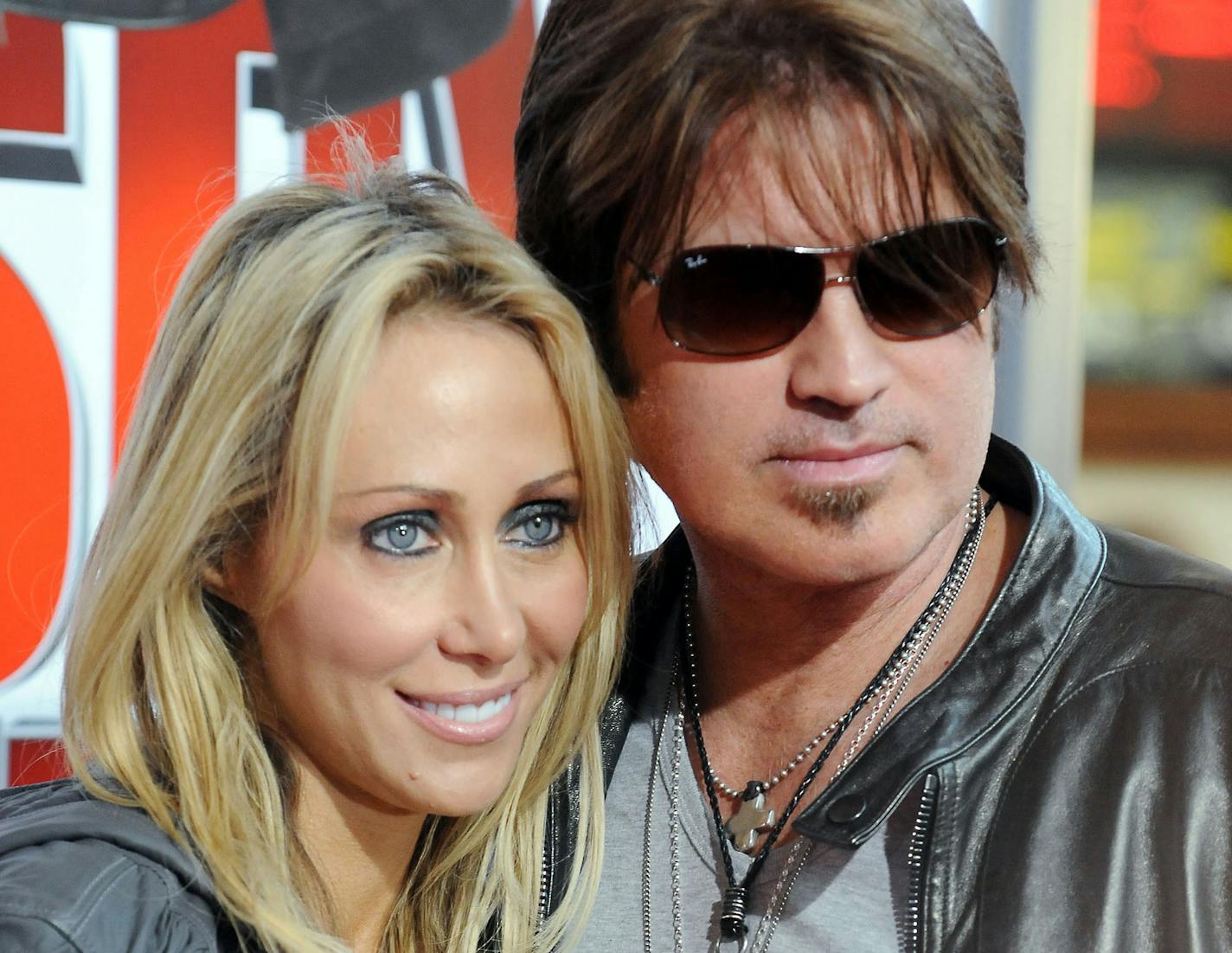 Billy Ray Cyrus, at right, and his wife Laeticia "Tish" Cyrus in 2010