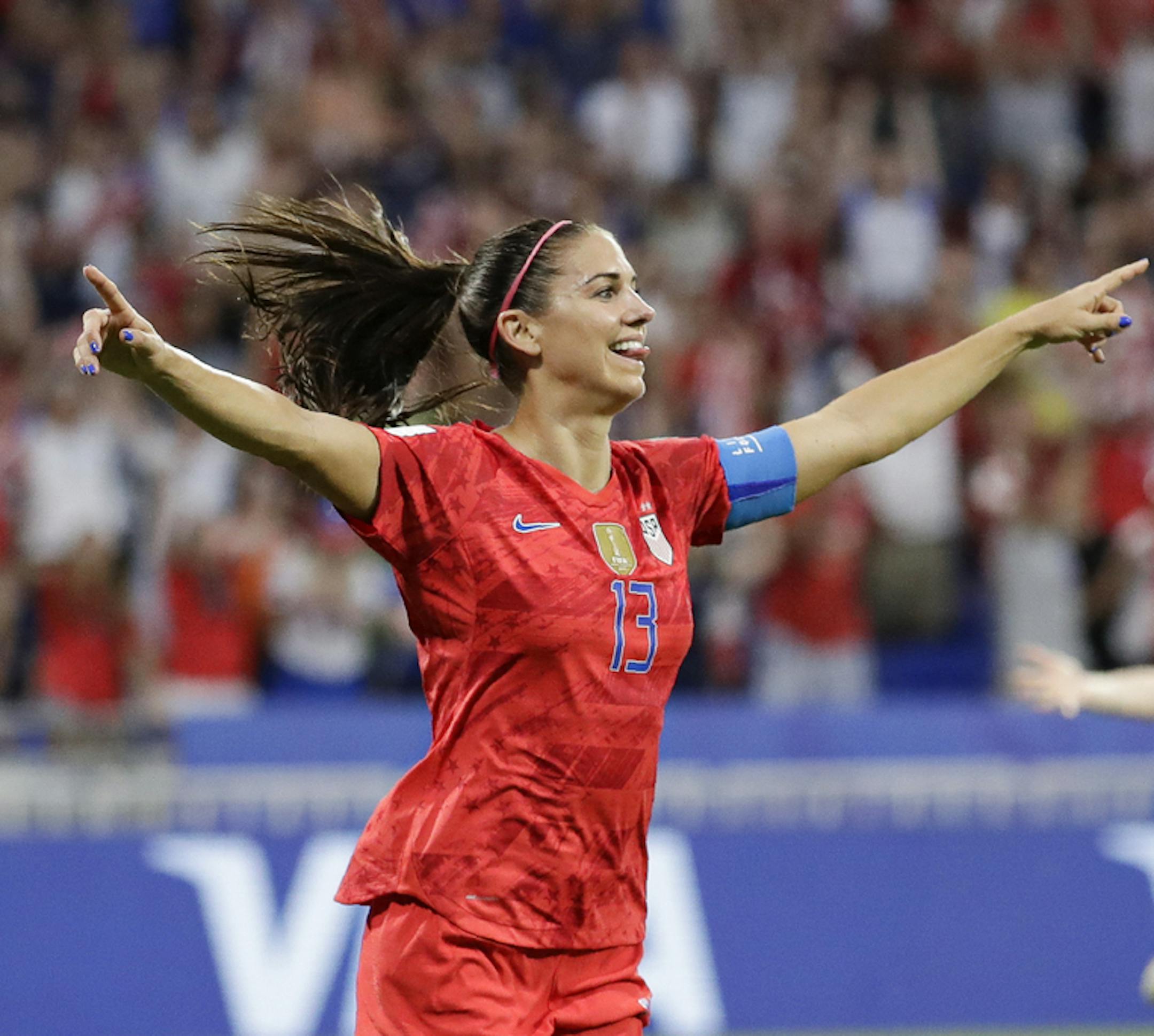 United States' Alex Morgan celebrates after scoring her side's second goal during the Women's World Cup semifinal soccer match between England and the United States, at the Stade de Lyon, outside Lyon, France, Tuesday, July 2, 2019. (AP Photo/Alessandra Tarantino)