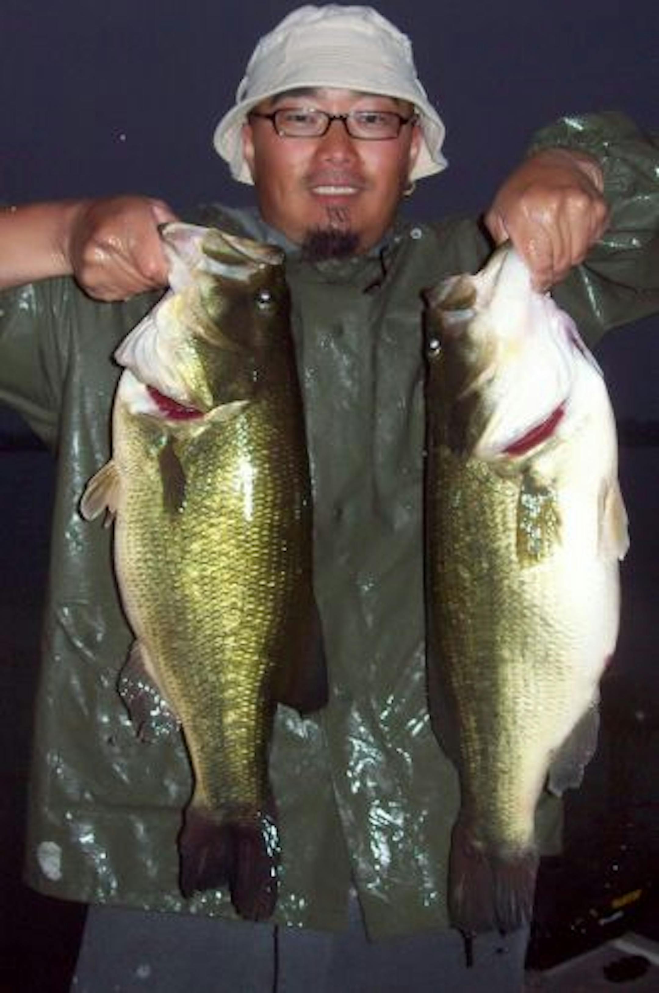 Teng Xiong of Woodbury and friend Andrew Mechelke of Eagan caught these trophy bass in a Twin Cities-area lake. One was 6-pound, 4-ounces, the other was 6 pounds, 7 ounces.