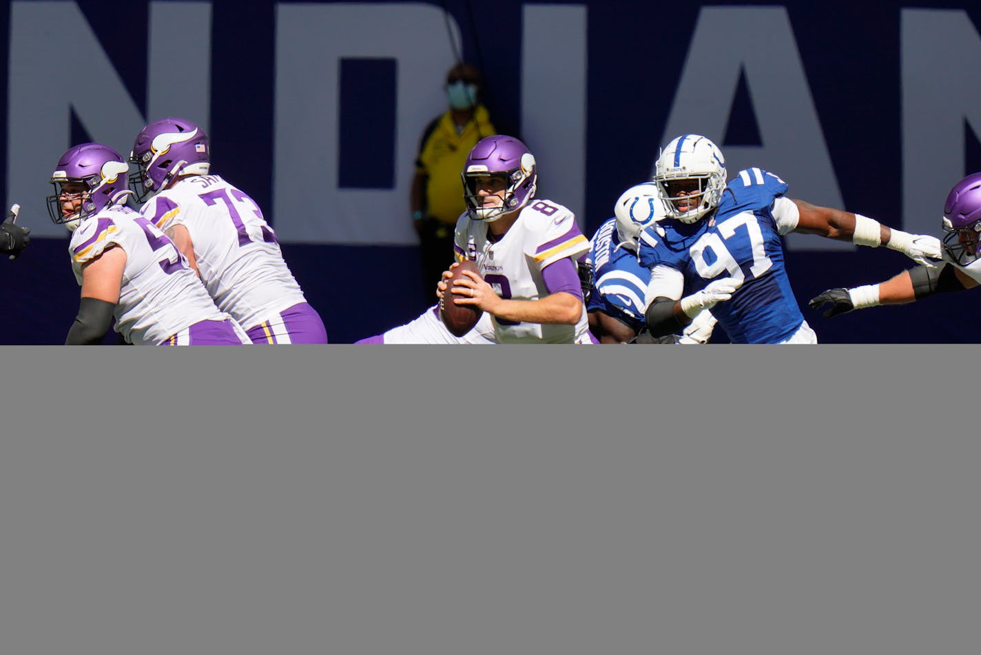 A familiar sight: Vikings quarterback Kirk Cousins was pressured by the Colts defense early and often on Sunday.