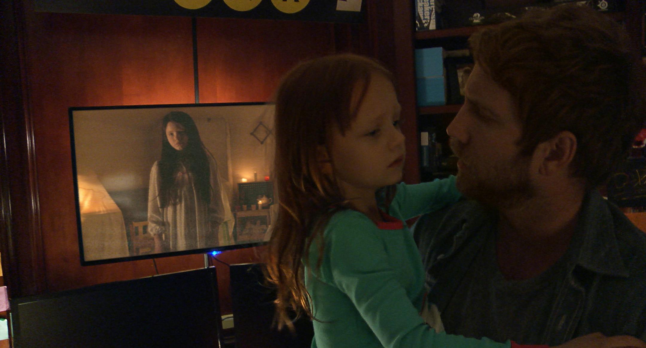 Paramount Pictures Left to right: Chloe Csengery plays Katie, Ivy George plays Leila, and Chris J. Murray plays Ryan in Paranormal Activity: The Ghost Dimension from Paramount Pictures.