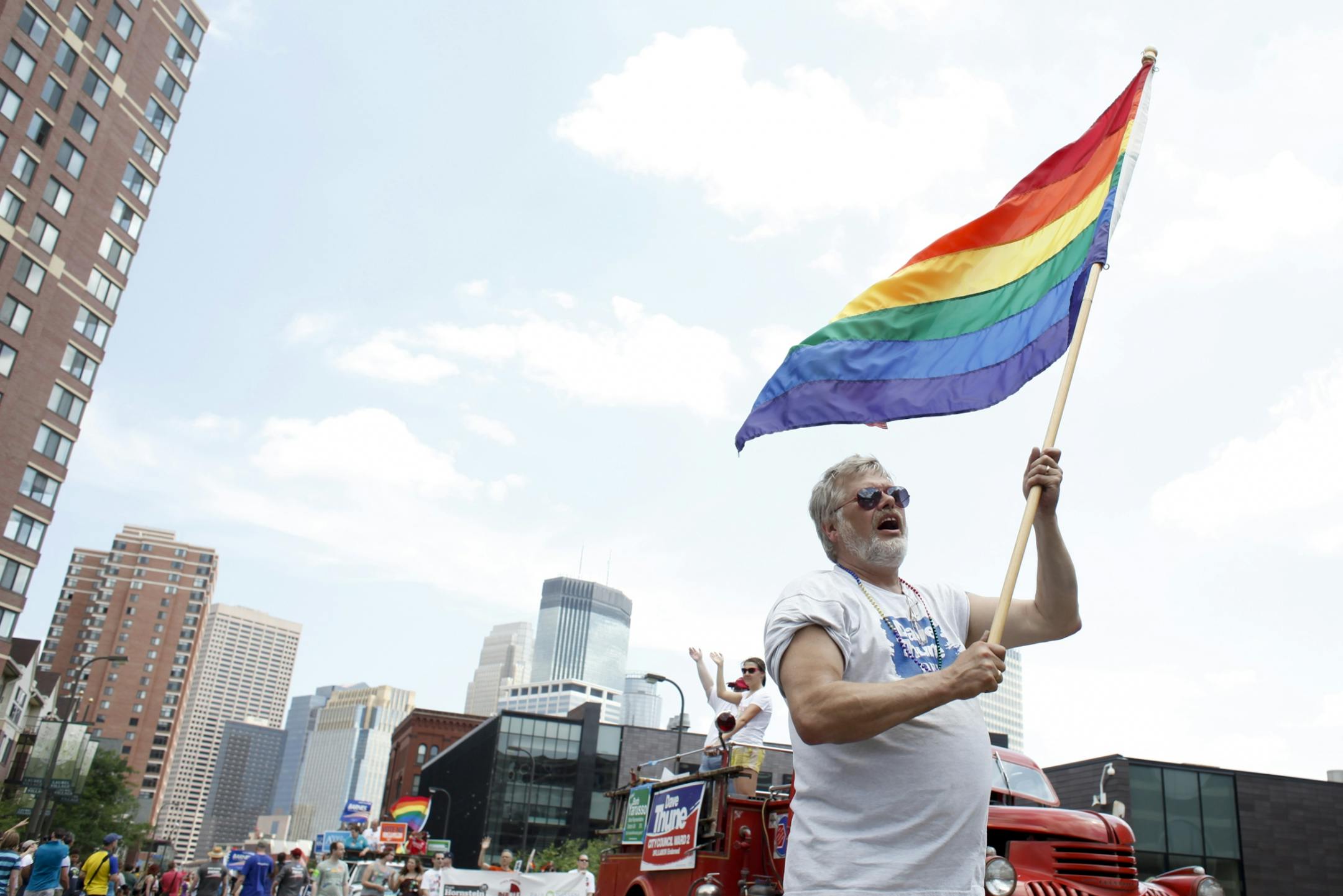 Dave Thune, city council member of St. Paul, marches in the 2012 Ashley Rukes GLBT Pride Parade in Minneapolis, Minn. Sunday, June 24, 2012.