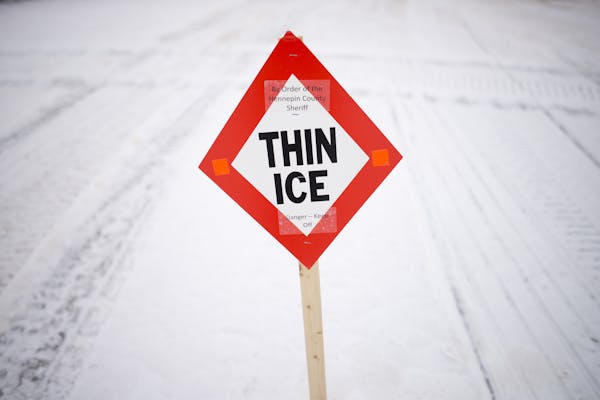 A thin ice sign marks the area under the bridge separating Grays Bay and Wayzata Bay. ] (Aaron Lavinsky | StarTribune) Over the course of a particular