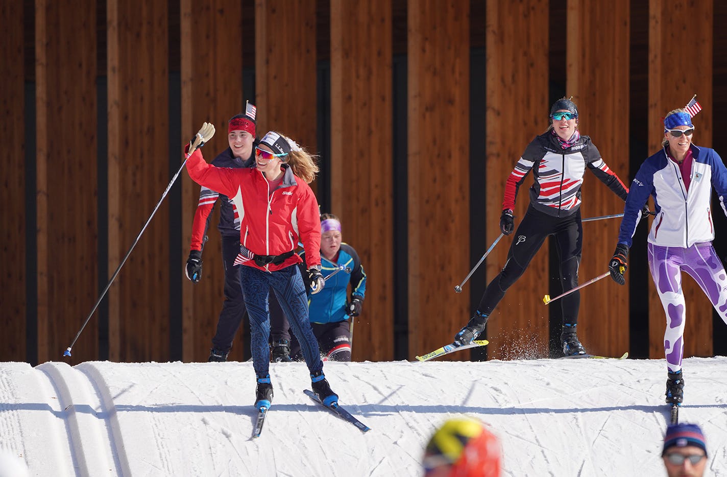 Jessie Diggins (left), the Olympic Gold Medal winning cross country skier from Stillwater, skied with local high school skiers at Theodore Wirth Park on Tuesday morning.