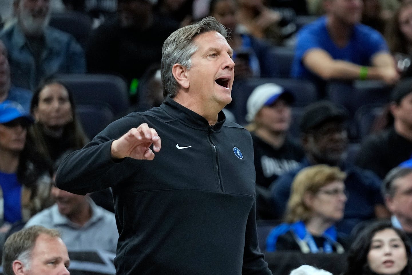 Minnesota Timberwolves head coach Chris Finch directs players on the court during the second half of an NBA basketball game against the Orlando Magic, Tuesday, Jan. 9, 2024, in Orlando, Fla. (AP Photo/John Raoux)