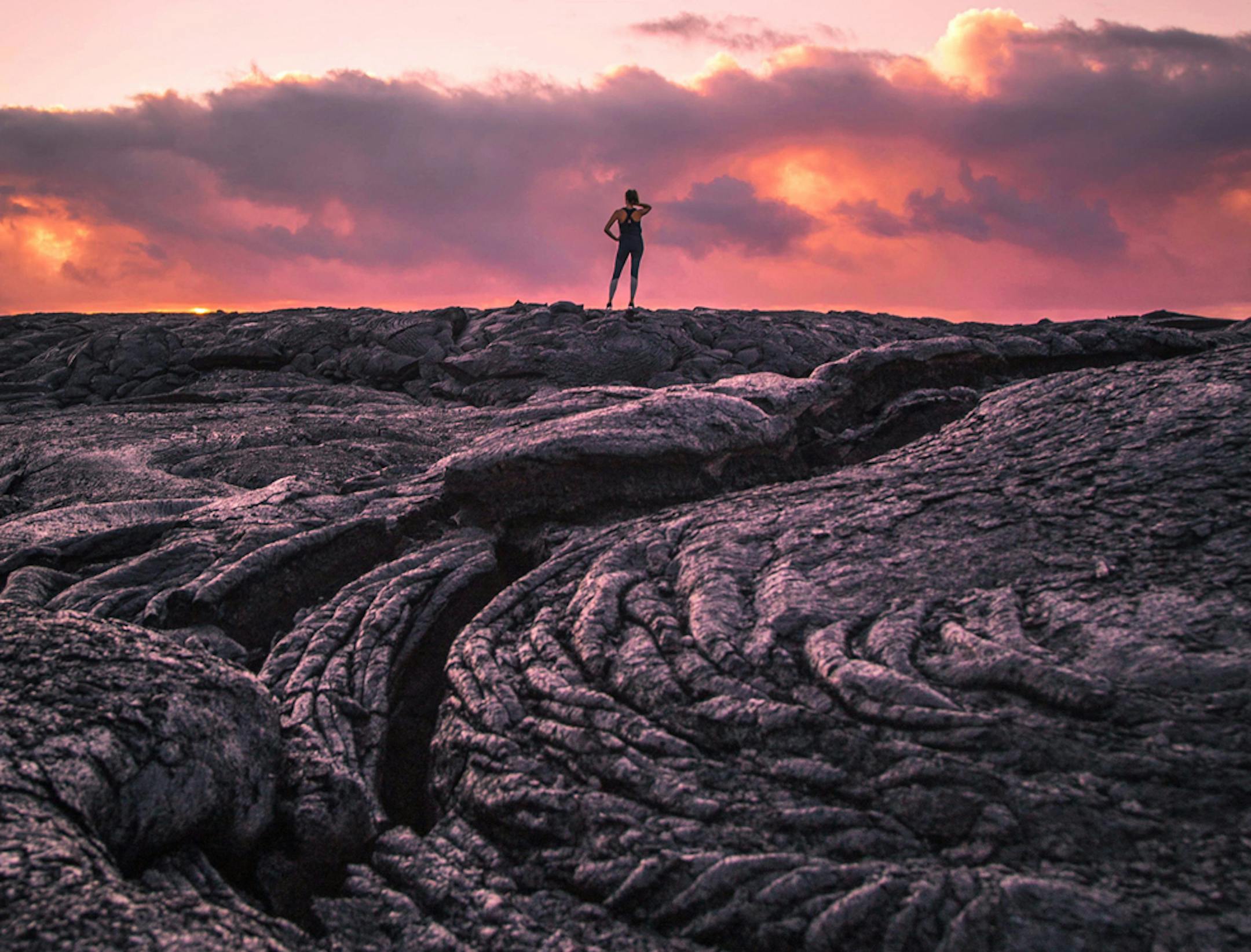 A lava field at sunset at Hawaii Volcanoes National Park. Hawaii Tourism Authority (HTA) / Tommy Lundberg