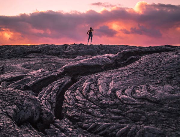 A lava field at sunset at Hawaii Volcanoes National Park. Hawaii Tourism Authority (HTA) / Tommy Lundberg