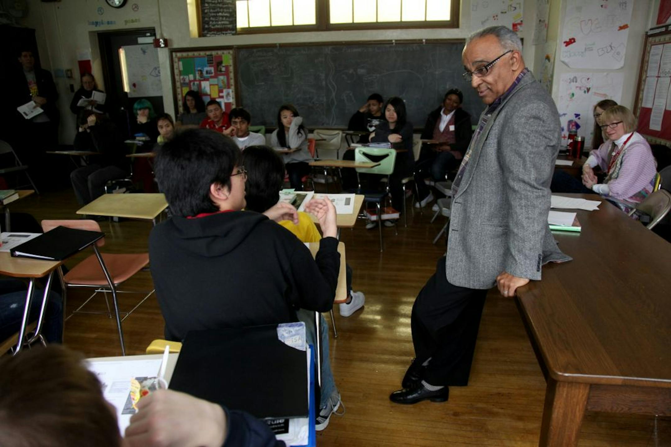 Benjamin Mchie talked to students during a presentation to a Patrick Henry High School 9th-grade class as part of National African American Parent Involvement Day, Monday, February 13, 2012. Michie calls the African American Registry �more of a calling than a career.� The 62-year-old Minneapolitan has spent thousands of hours updating the website, with history and videos. A profile of the man and his quest.(ELIZABETH FLORES/STAR TRIBUNE) ELIZABETH FLORES � eflores@startribune.com