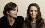 FILE - In this Jan. 7, 2011, file photo, actor Ashton Kutcher, left, and actress Natalie Portman, from the film "No Strings Attached" pose for a portr