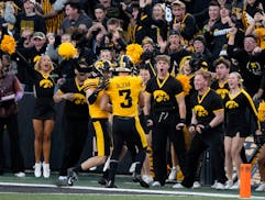 Iowa celebrated after a touchdown by defensive back Cooper DeJean (3), who returned a punt late in the game against Minnesota on Saturday in Iowa City