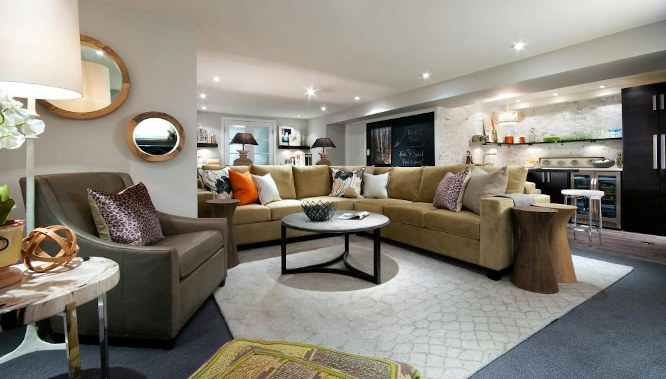 After: This warm and welcoming family room is as suitable for quiet family movie nights as it is for the end-of-season hockey party.