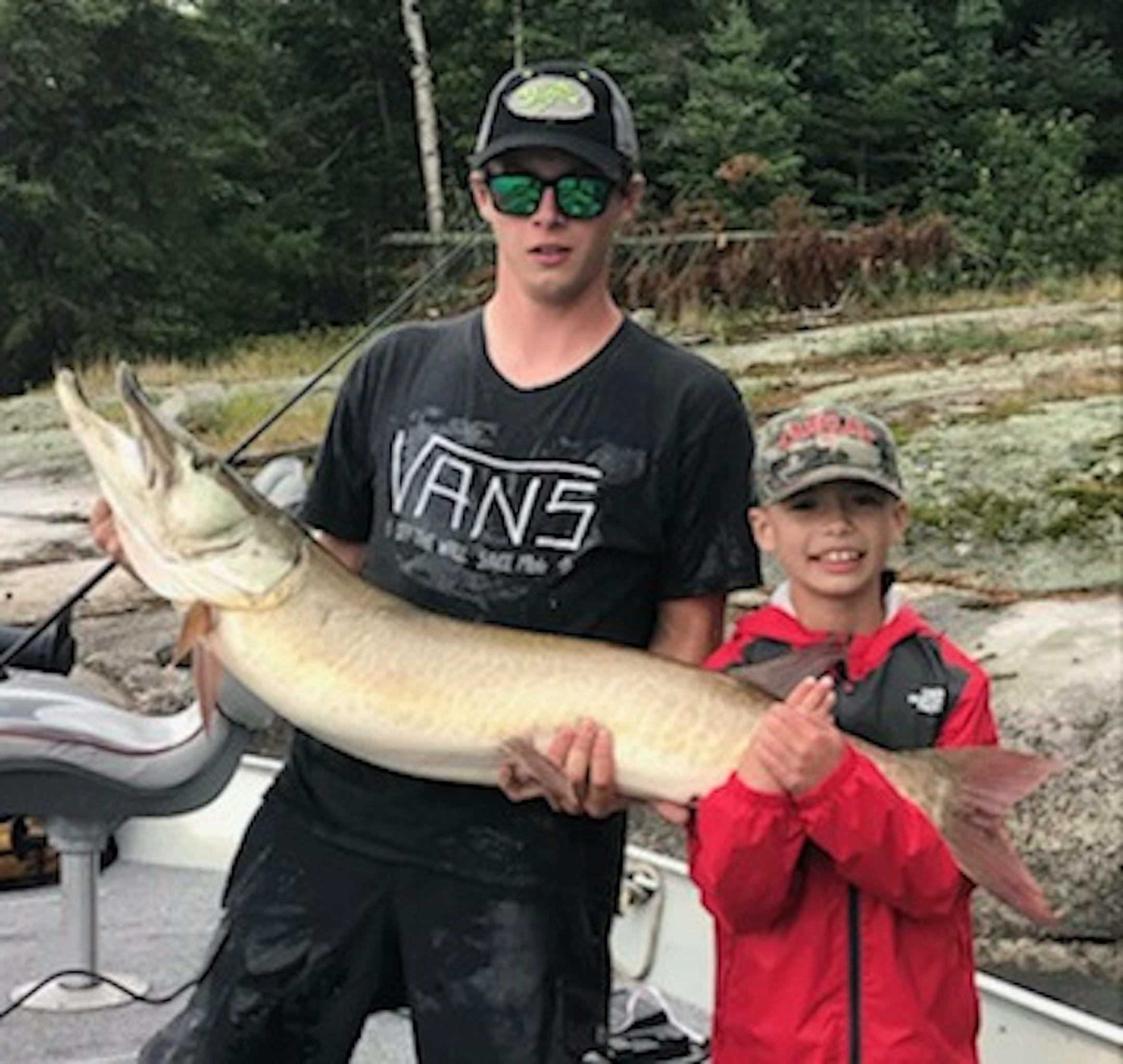 Wyatt Gerry, 8, right, and his brother Phoenix.