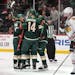 Teammates celebrate with Minnesota Wild center Joel Eriksson Ek (14) after he scored in the first period.