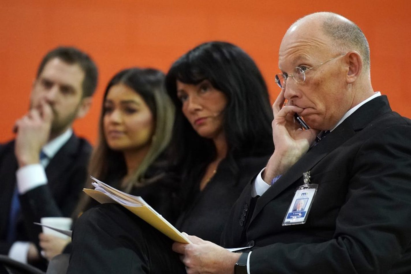 Minnesota Department of Corrections Commissioner Paul Schnell, right, listened as he sat with DOC Deputy Commissioner Sarah Walker during Wednesday's House Corrections Committee hearing.