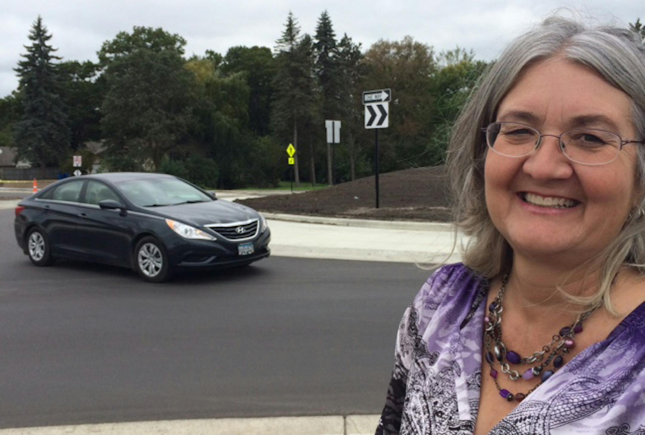 #943942
School Board Chair Marsha Van Denburgh outside a new roundabout in front of the St. Francis High School. credit: Janet Moore/Star Tribune