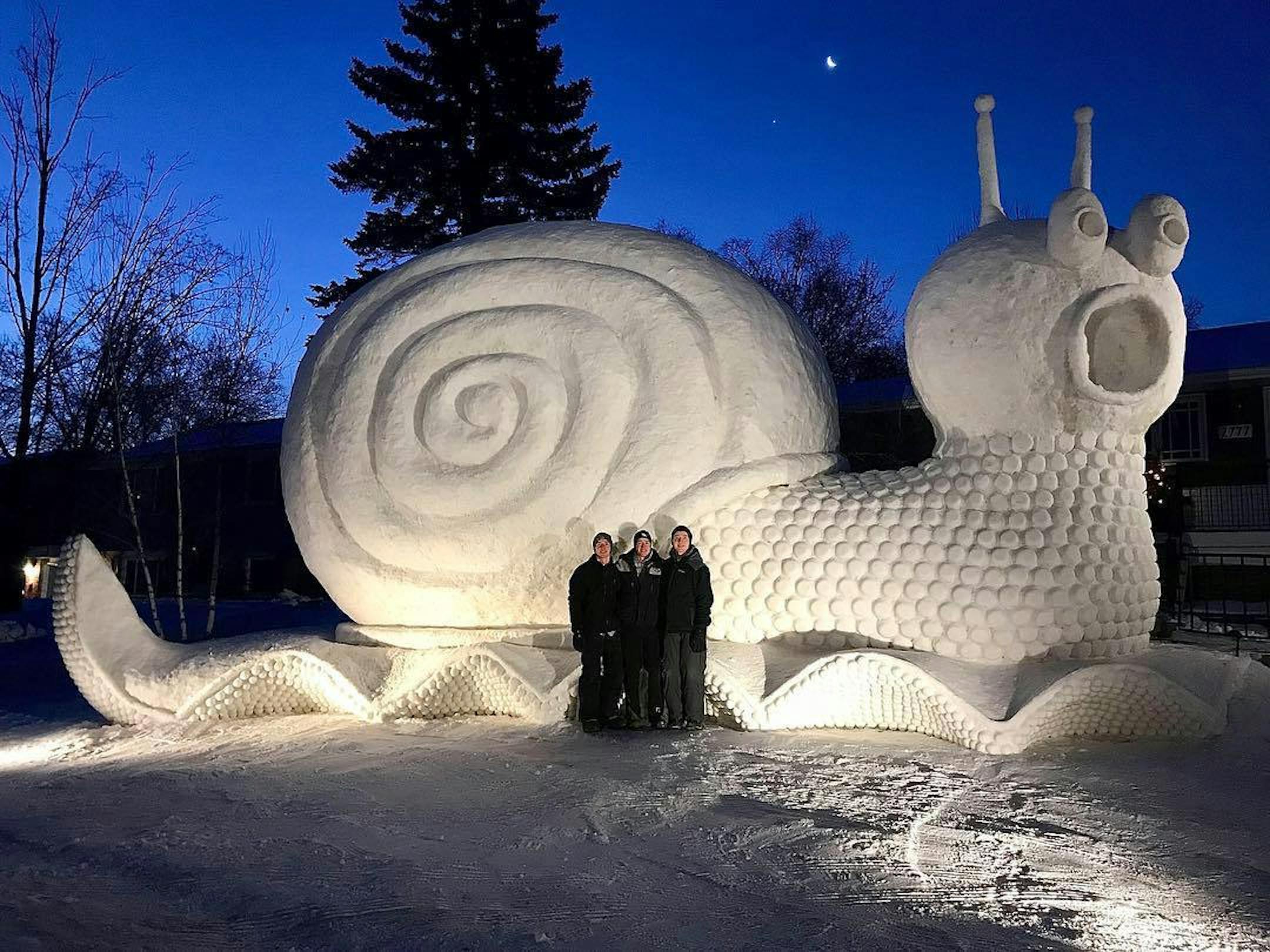 The Bartz brothers unveiled their latest snow sculpture, Slinky the Snail. ORG XMIT: DhvqfzT0Nut8PsLmsUSY