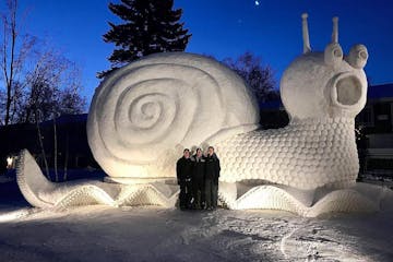 The Bartz brothers unveiled their latest snow sculpture, Slinky the Snail. ORG XMIT: DhvqfzT0Nut8PsLmsUSY