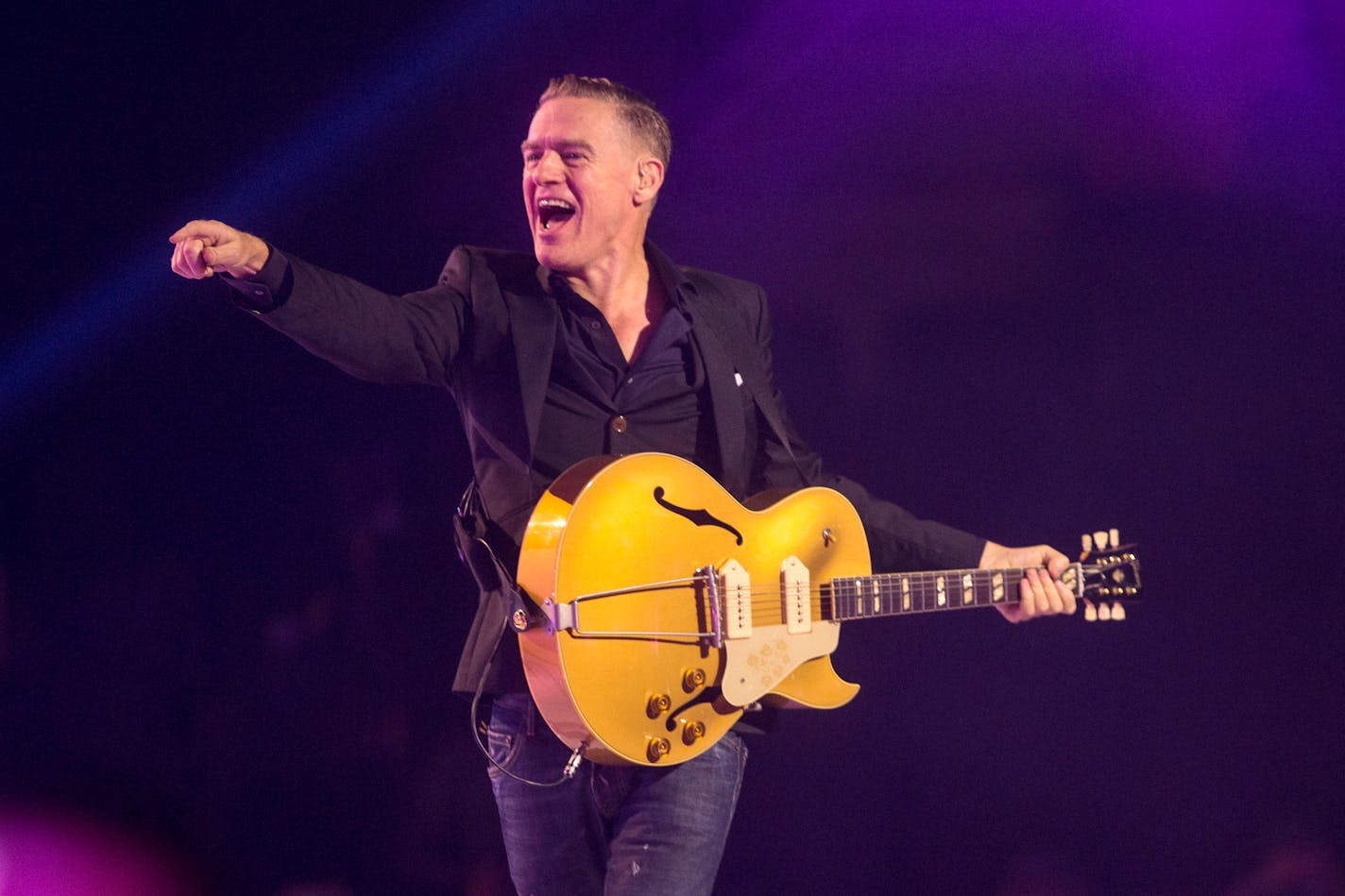 FILE - Bryan Adams performs during the Invictus Games closing ceremony in Toronto, on Sept. 30, 2017. Adams is nominated for a Grammy for best rock performance for "So Happy It Hurts." (Chris Young/The Canadian Press via AP, File)