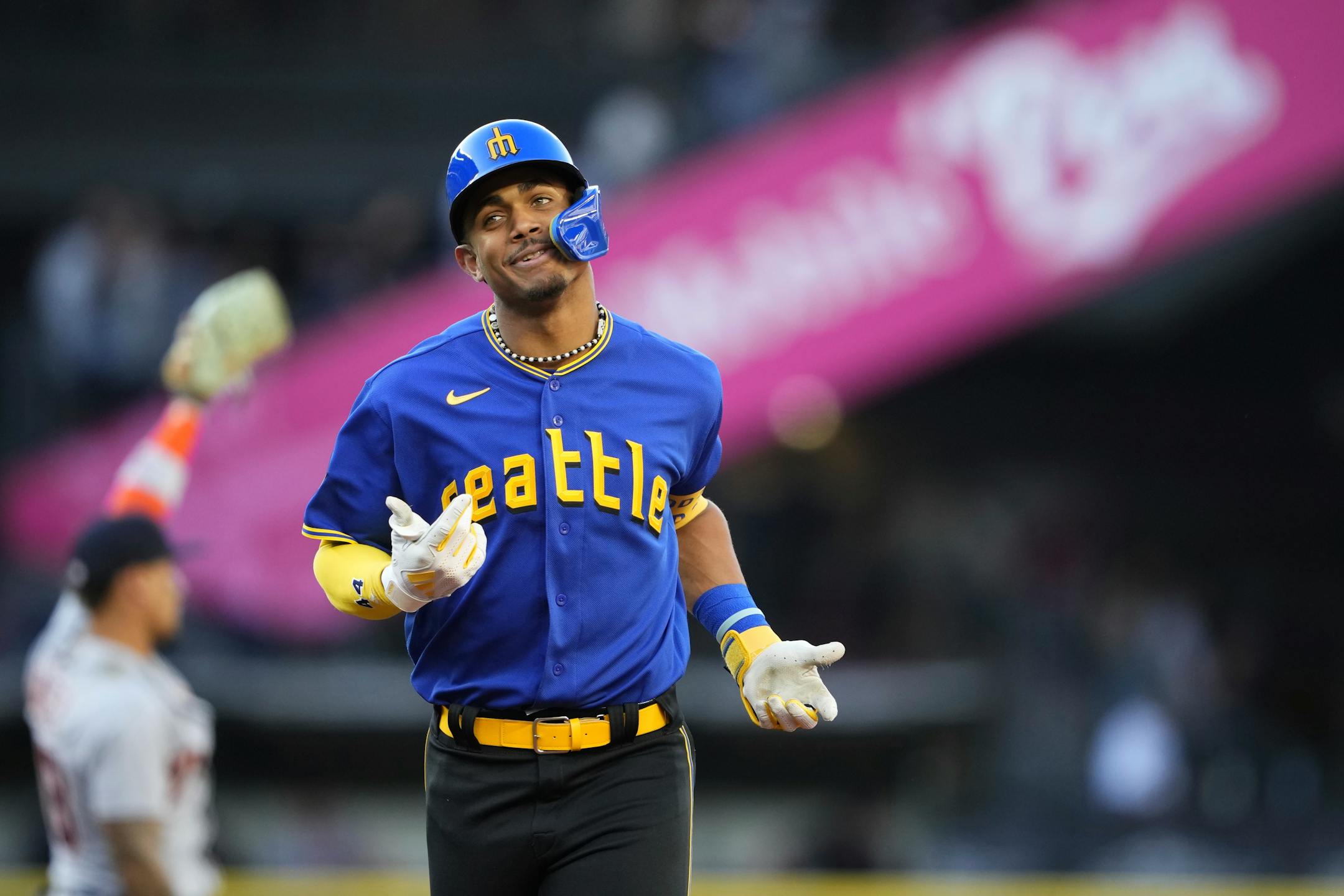 Seattle Mariners' Julio Rodriguez shrugs after his fly ball was caught by Detroit Tigers center fielder Matt Vierling at the wall during the first inning of a baseball game Friday, July 14, 2023, in Seattle. (AP Photo/Lindsey Wasson)