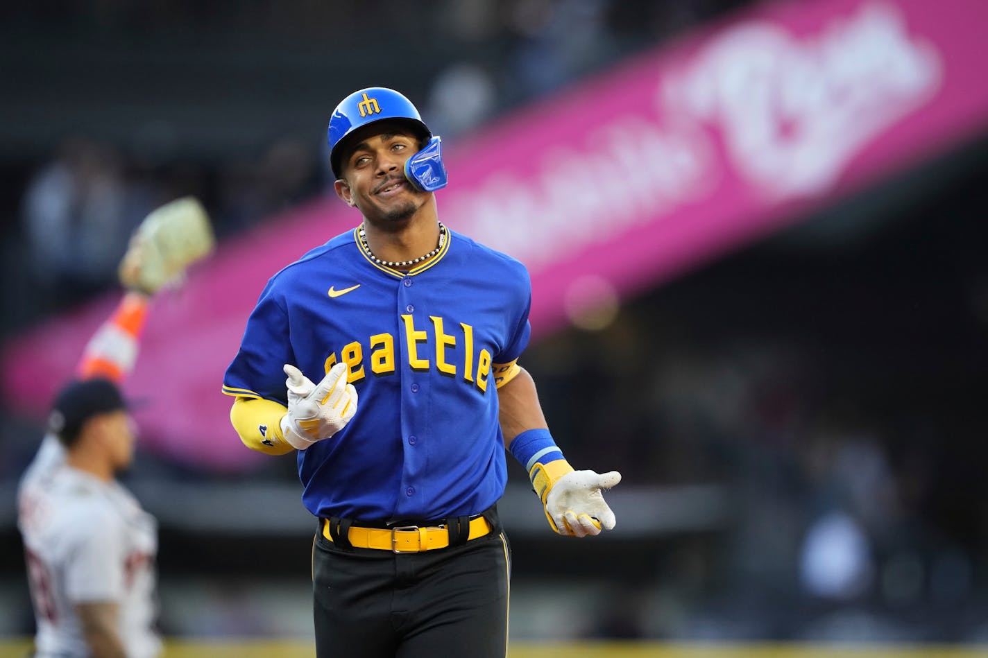 Seattle Mariners' Julio Rodriguez shrugs after his fly ball was caught by Detroit Tigers center fielder Matt Vierling at the wall during the first inning of a baseball game Friday, July 14, 2023, in Seattle. (AP Photo/Lindsey Wasson)