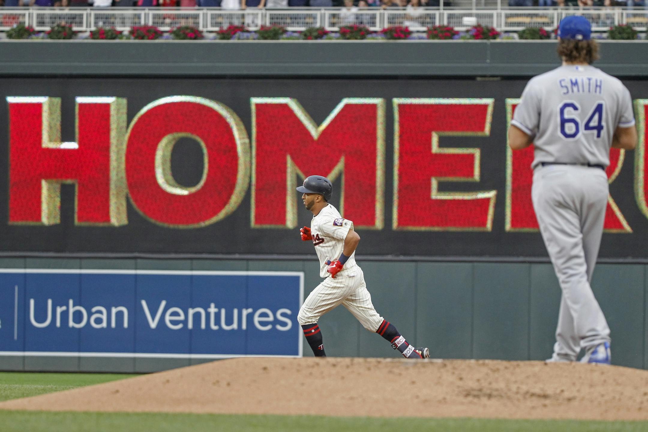 Minnesota Twins left fielder Eddie Rosario runs the bases on his solo home run off of Kansas City Royals relief pitcher Burch Smith (64) in the first inning of a baseball game Saturday, Aug. 4, 2018, in Minneapolis. (AP Photo/Bruce Kluckhohn)SOCA ISOCA
