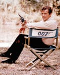 British actor Roger Moore, playing the title role of secret service agent 007, James Bond, is shown on location in England in 1972. Moore, played Bond