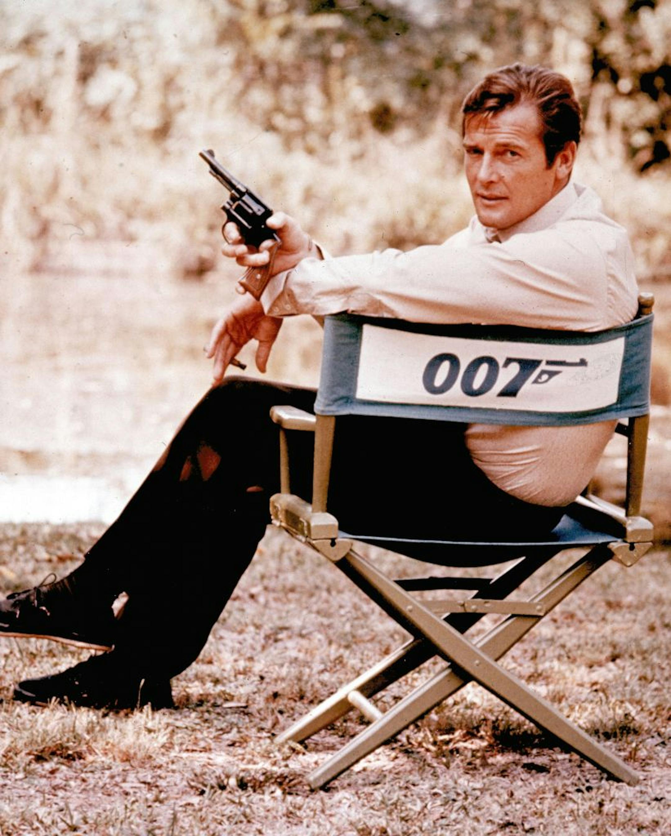 British actor Roger Moore, playing the title role of secret service agent 007, James Bond, is shown on location in England in 1972. Moore, played Bond in seven films, more than any other actor. Roger Moore's family said Tuesday May 23, 2017 that the former James Bond star has died after a short battle with cancer