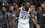 The Timberwolves' Andrew Wiggins was greeted by teammates after making his third three-pointer late in the fourth quarter against the Heat on Oct. 27.