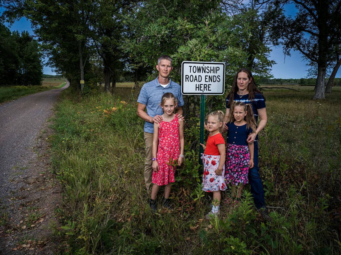 Renee and Andy Crisman with their daughters in August 2021.