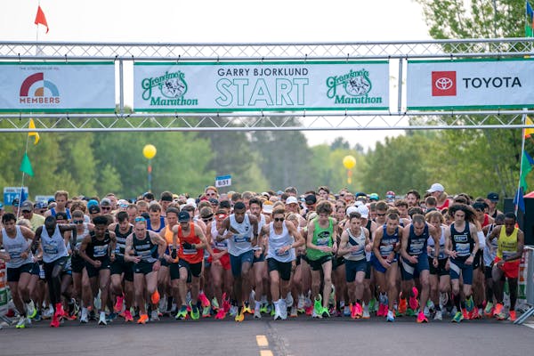 Racers took off at the start of the Garry Bjorklund Half Marathon in Duluth on Saturday morning.