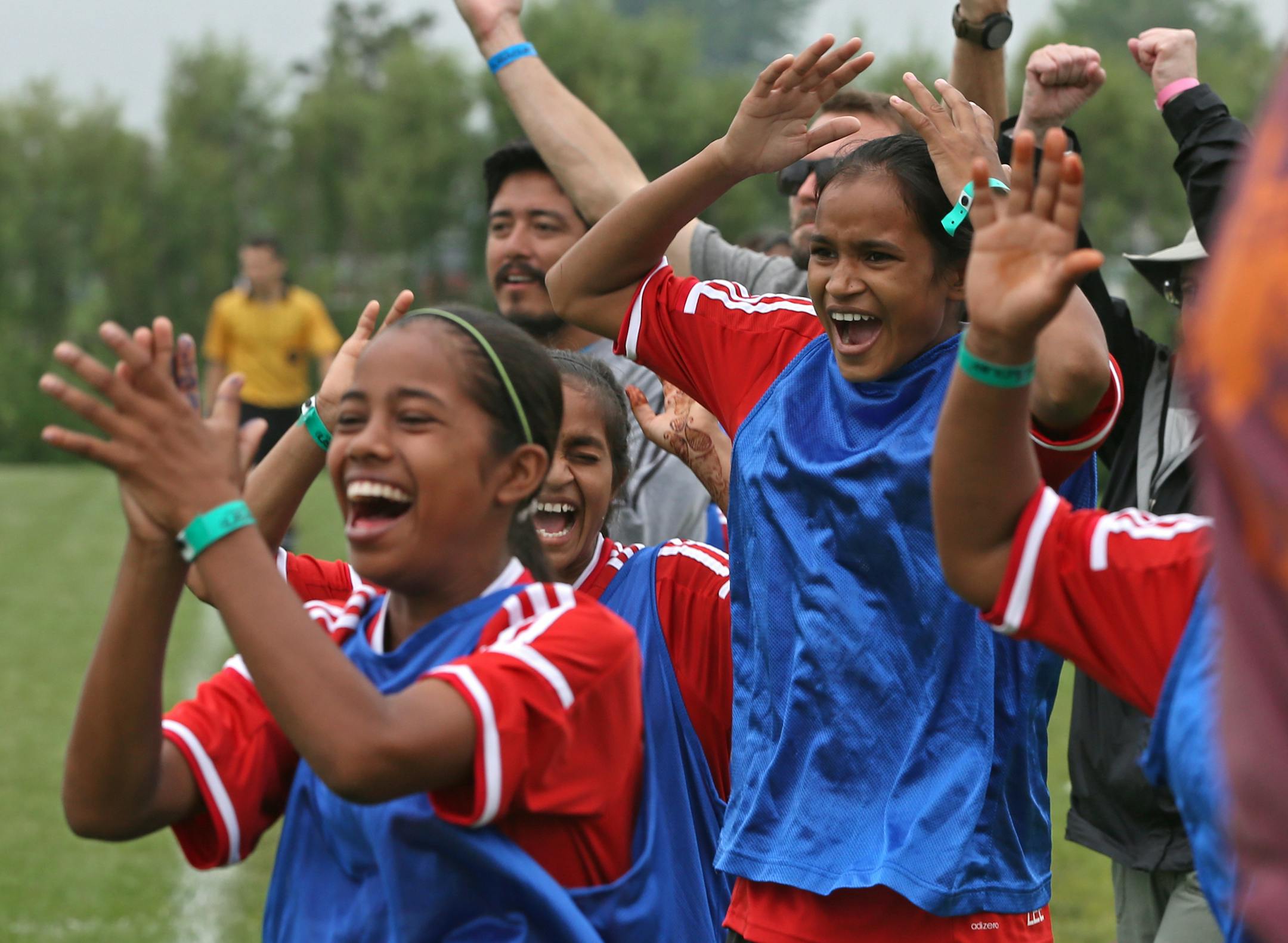 The Yuma Supergoats cheered after they scored on the Colorado United White on 7/12/14, at the Schwan's Cup. Schwan's Cup feature on the Yuwa Supergoats, a girls' team from India. The team comes from a very poor part of India where girls are married off by age 16. Thus this team is a bit of an anomaly as it defies the female stereotypes in that culture. They've also had quite a lot of backlash and media coverage in India.] We can't use any of the names of the players for security reason, there ha
