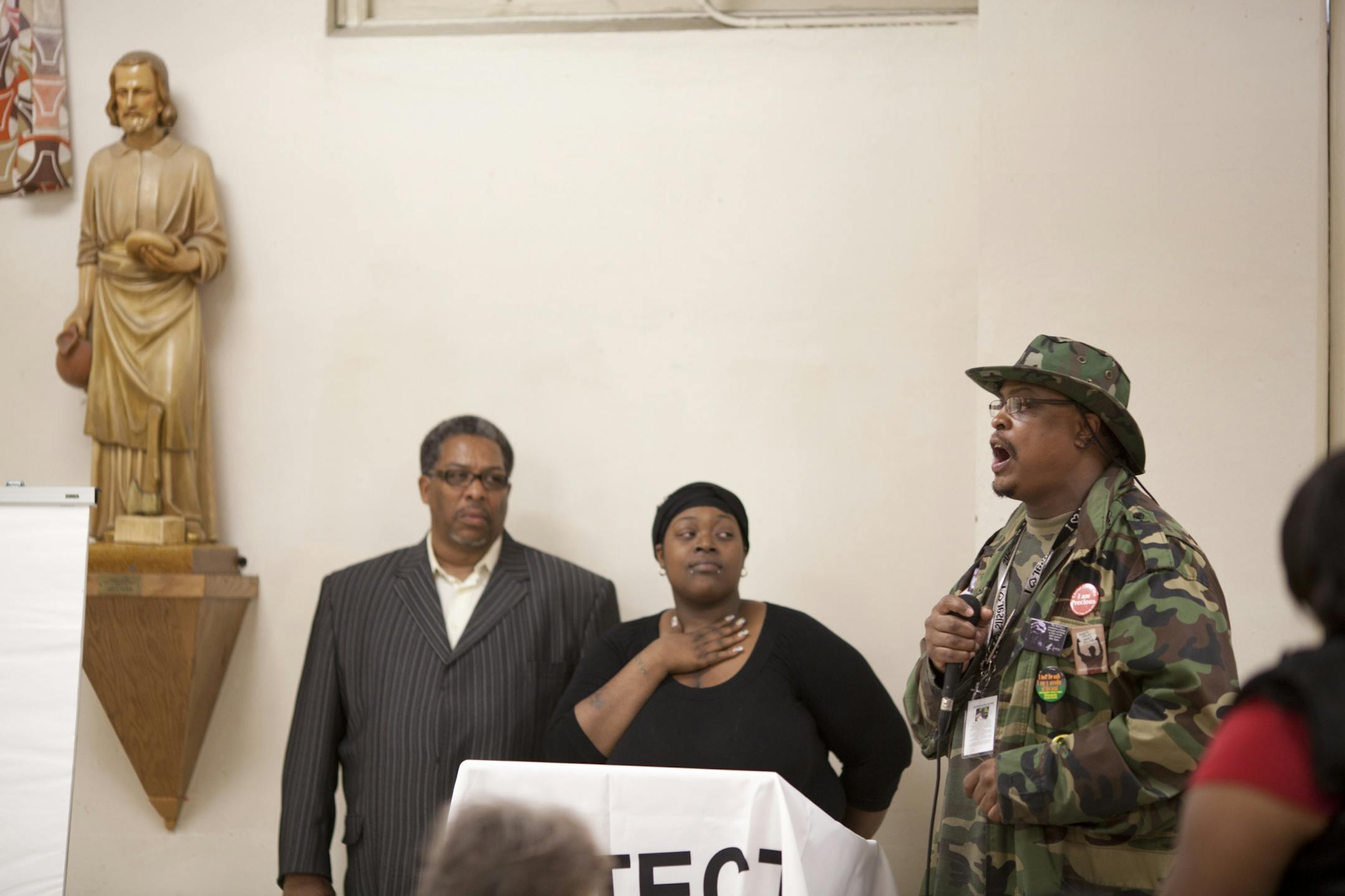 From left, V.J. Smith of MAD DADS, Marsha Mayes and K.G. Wilson of Hope Ministries met last March at an Ending Violent Cycles event in the aftermath of the shooting death of Mayes' 3-year-old son, Terrell.