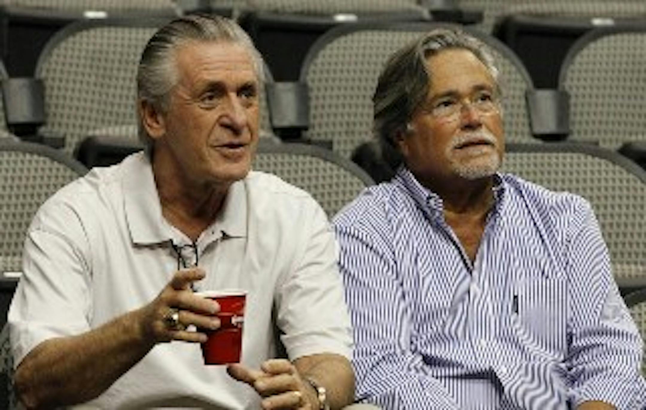 Heat President Pat Riley with a very cleaned up Jeffrey Lebowski. Er, Heat owner Micky Arison