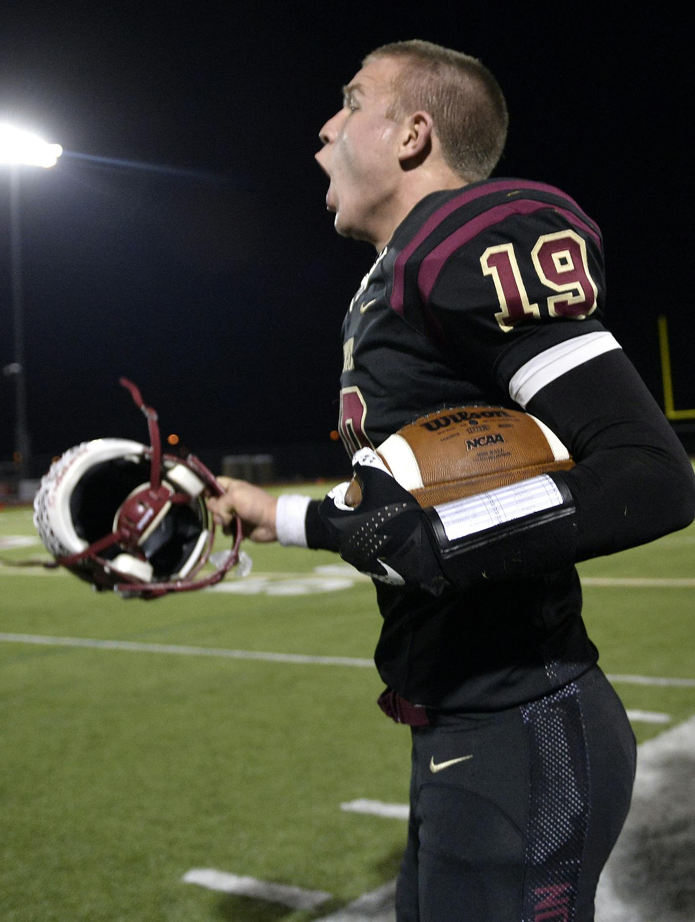 Maple Grove quarterback Brad Davison (19 / 19) celebrated a defensive stop on Edina's final drive of the game Friday. Maple Grove won 21-17 off a late touchdown. ] (AARON LAVINSKY/STAR TRIBUNE) aaron.lavinsky@startribune.com Edina played Maple Grove in a 6A playoff game on Friday, Nov. 4, 2016 at Maple Grove High School.